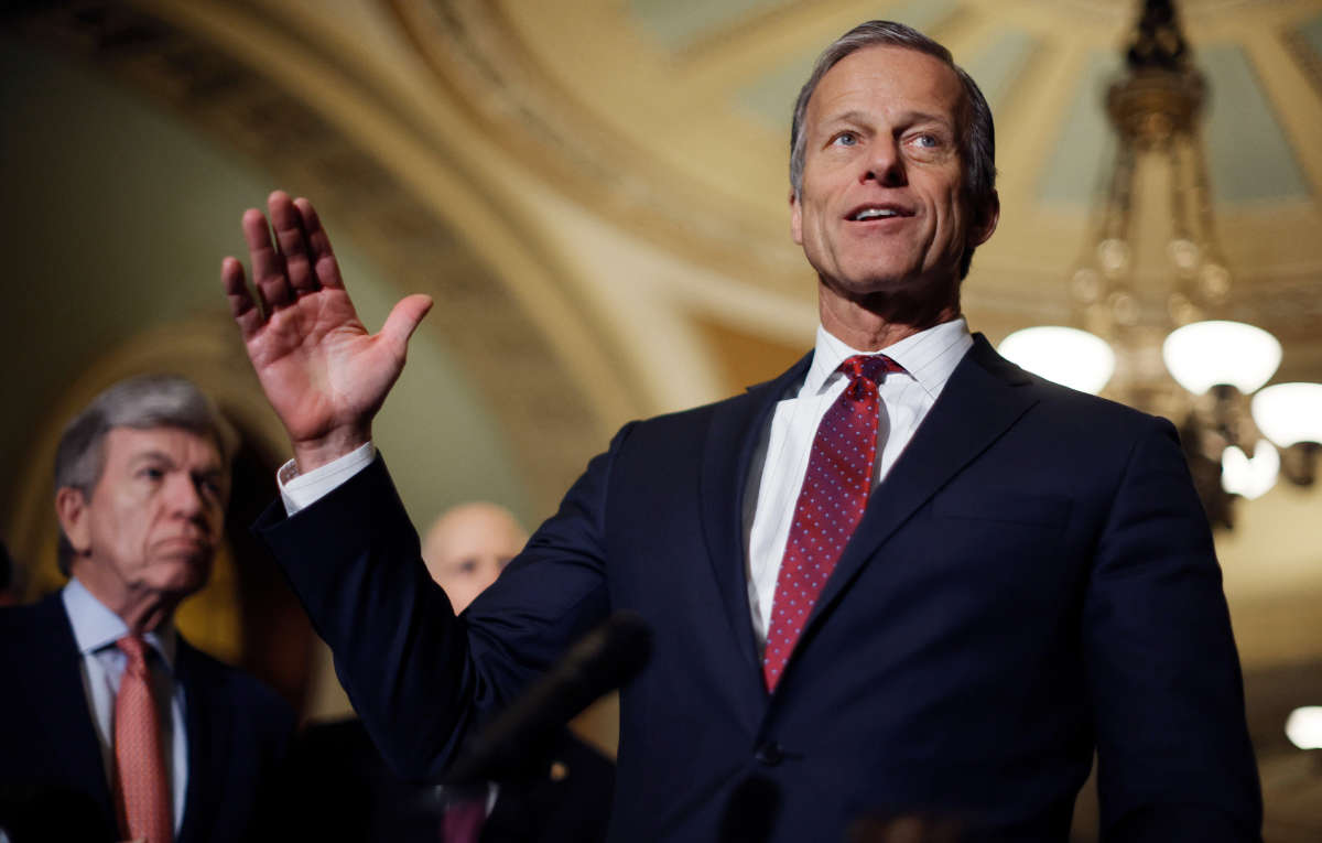 Sen. John Thune talks to reporters with Sen. Roy Blunt, left, following the weekly Senate Republican policy luncheon at the U.S. Capitol on March 29, 2022, in Washington, D.C.