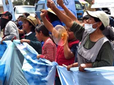 The caravan began in Puebla, where people marched past a Bonafont (Danone) water bottling plant and said their water is not for sale.