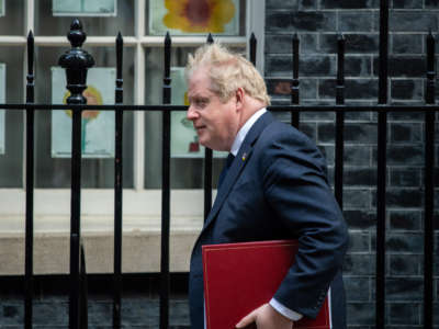 British Prime Minister Boris Johnson leaves 10 Downing Street on April 20, 2022, in London, England.
