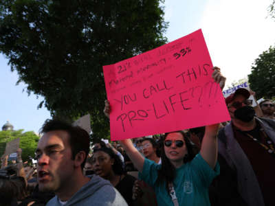 Anti-abortion and abortion rights demonstrators during a protest outside the U.S. Supreme Court in Washington, D.C., on May 3, 2022.