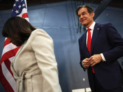 Pennsylvania U.S. Senate candidates Kathy Barnette and Mehmet Oz walk off the stage after speaking at a Republican leadership forum at Newtown Athletic Club on May 11, 2022, in Newtown, Pennsylvania.