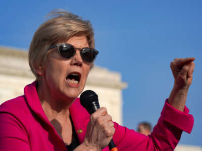 Sen. Elizabeth Warren speaks in front of the U.S. Supreme Court on May 3, 2022, in Washington, D.C.