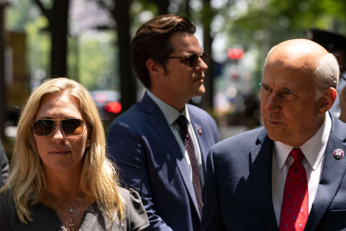 From left, Representatives Marjorie Taylor Greene, Matt Gaetz and Louie Gohmert unsuccessfully try to gain entry to the U.S. Department of Justice on July 27, 2021, in Washington, D.C.
