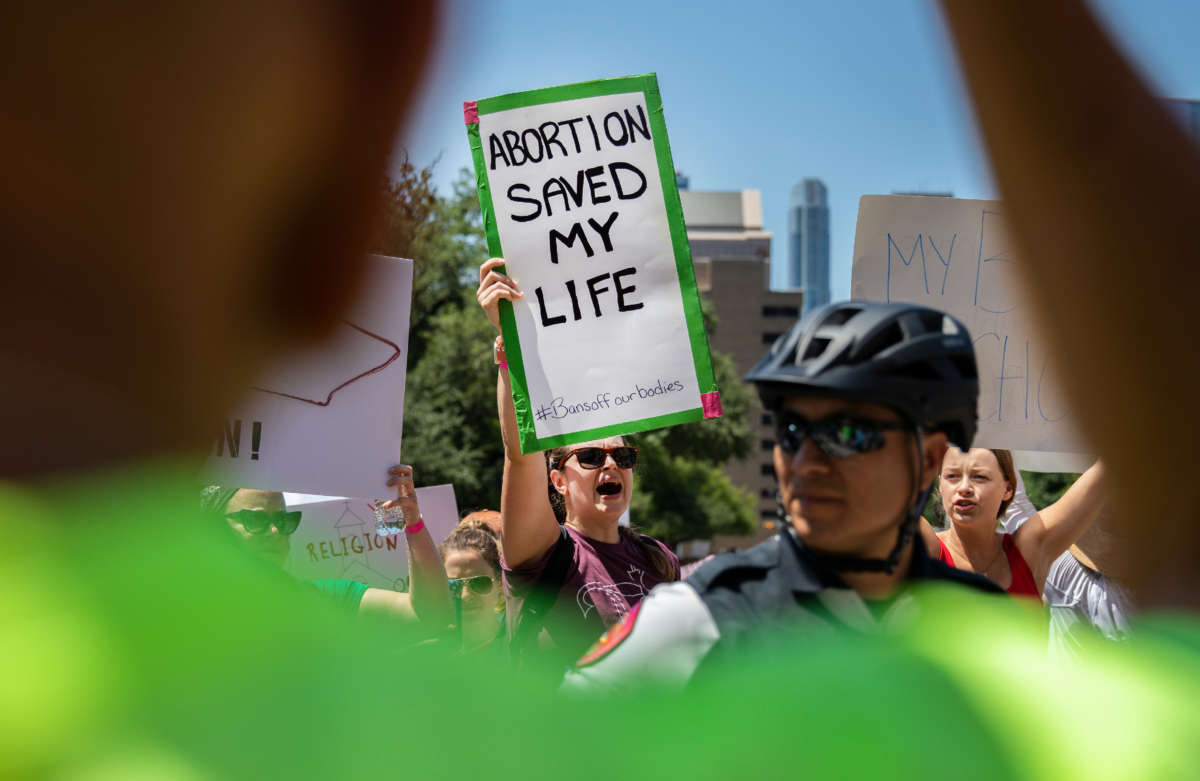 Abortion-rights supporters face anti-abortion protesters at a rally for reproductive rights at the Texas Capitol on May 14, 2022, in Austin, Texas.