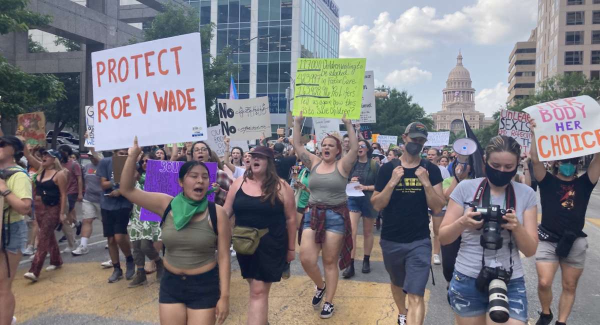 Austin area protesters march down Congress Avenue after rallying against the Supreme Court's potential reversal of Roe v. Wade at the State Capitol on May 3, 2022 in Austin, Texas.