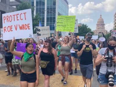 Austin area protesters march down Congress Avenue after rallying against the Supreme Court's potential reversal of Roe v. Wade at the State Capitol on May 3, 2022 in Austin, Texas.