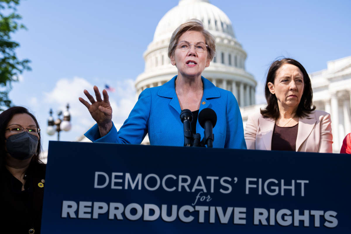 From left, Senators Tammy Duckworth, Elizabeth Warren and Maria Cantwell conduct a news conference outside the U.S. Capitol to voice support of abortion rights on May 19, 2022.