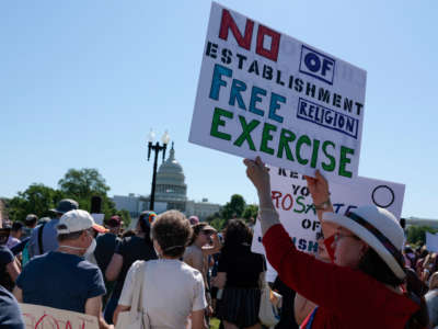 A protester carries a sign as they attend the Jewish Rally for Abortion Justice rally at Union Square near the U.S. Capitol on May 17, 2022, in Washington, D.C.
