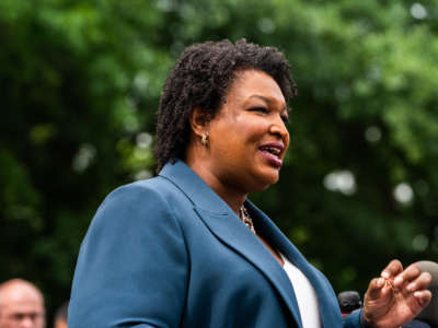 Stacey Abrams delivers remarks and answers questions from reporters regarding the Georgia Primary at the Israel Missionary Baptist Church on May 24, 2022.