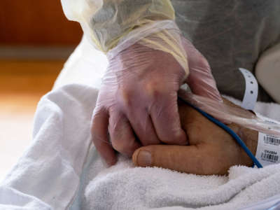 An intensivist for critical care checks on a patient inside the ICU at Adventist Health Glendale on September 1, 2021, in Glendale, California.