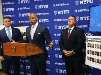 New York Mayor Eric Adams is joined by NYPD Deputy Chief Jason Savino, left, and NYPD Chief of Detectives James Essig at a Brooklyn police facility on June 6, 2022, in New York City.