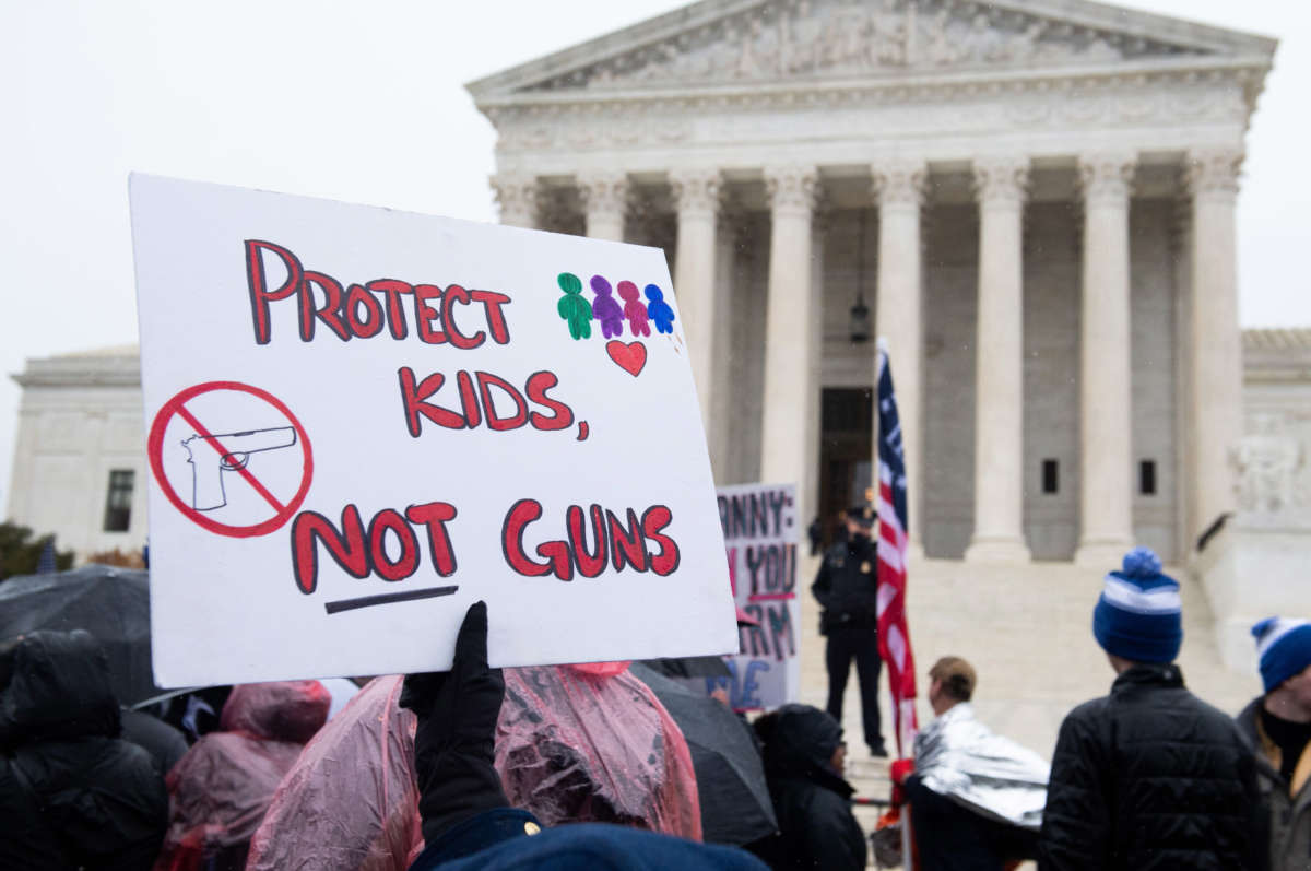 Supporters of gun control and firearm safety measures hold a protest rally outside the U.S. Supreme Court on December 2, 2019, in Washington, D.C.
