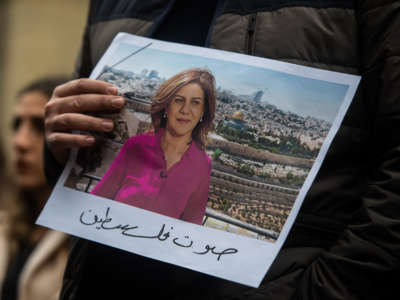 Tributes are paid to murdered Palestinian journalist Shireen Abu Akleh at a protest and vigil at BBC Broadcasting House on May 12, 2022, in London, England.