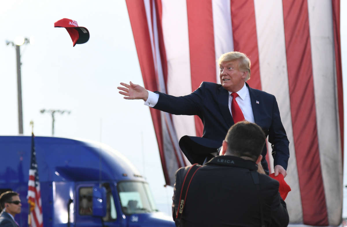 Donald Trump arrives to give remarks during a rally at the Adams County Fairgrounds on June 25, 2022, in Mendon, Illinois.