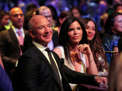 Jeff Bezos and Lauren Sanchez attend the Robin Hood Benefit 2022 at Jacob Javits Center on May 9, 2022, in New York City.