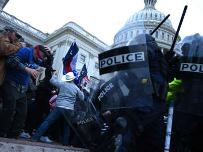 Trump supporters clash with police and security forces as they storm the U.S. Capitol in Washington, D.C., on January 6, 2021.