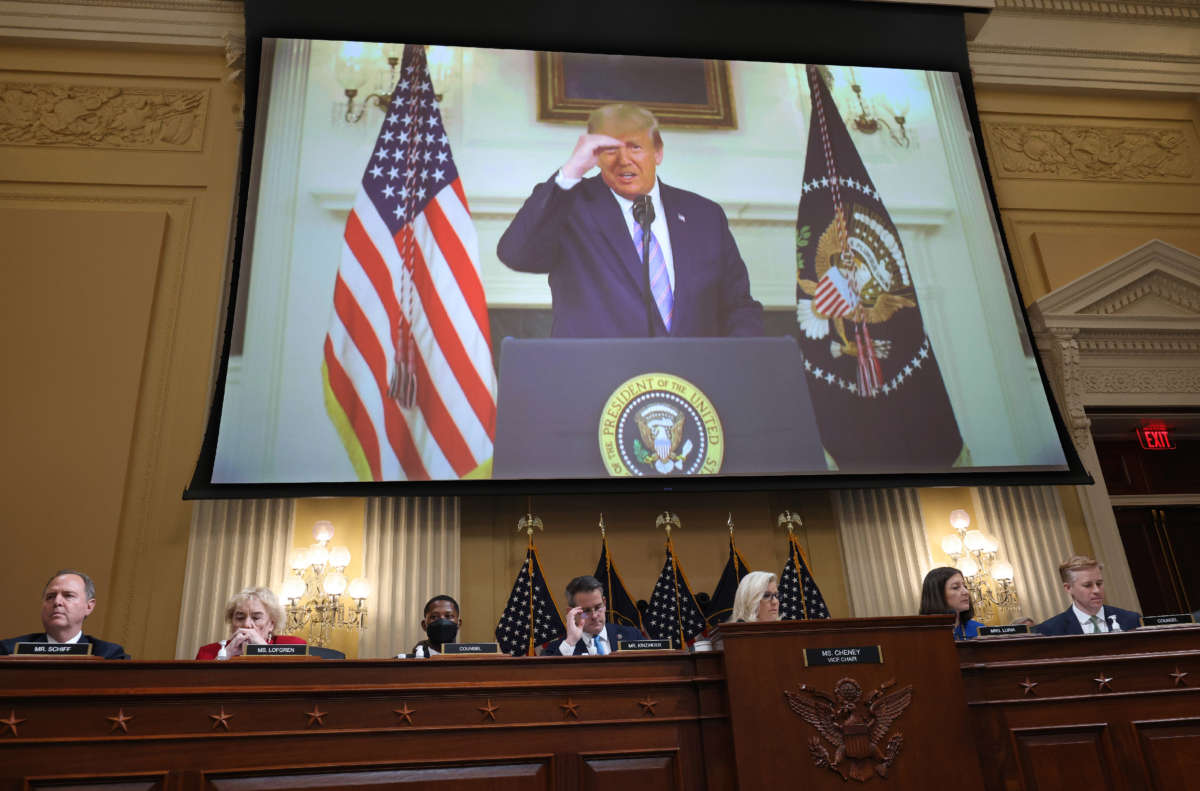 Then-President Donald Trump is seen on a screen as the House Select Committee to Investigate the January 6th Attack on the U.S. Capitol hold a prime-time hearing in the Cannon House Office Building on July 21, 2022, in Washington, D.C.