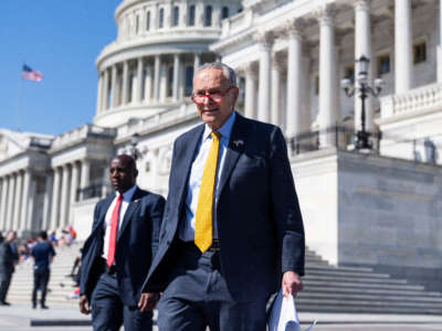 Senate Majority Leader Charles Schumer makes his way to a news conference outside the U.S. Capitol on May 19, 2022.