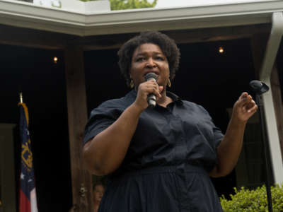 Georgia gubernatorial candidate Stacey Abrams speaks to supporters and members of the Rabun County Democrats group on July 28, 2022, in Clayton, Georgia.