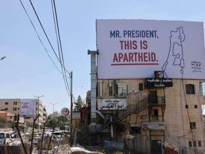 A billboard in Bethlehem that reads "Mr. President, this is apartheid" ahead of President Joe Biden's visit
