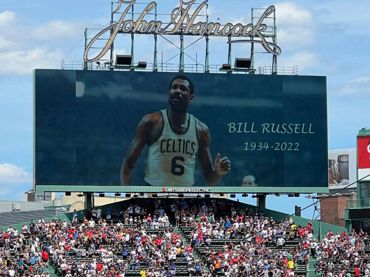 Red Sox fans at Fenway Park in Boston, Massachusetts, receive word on the passing of Celtics great Bill Russell.
