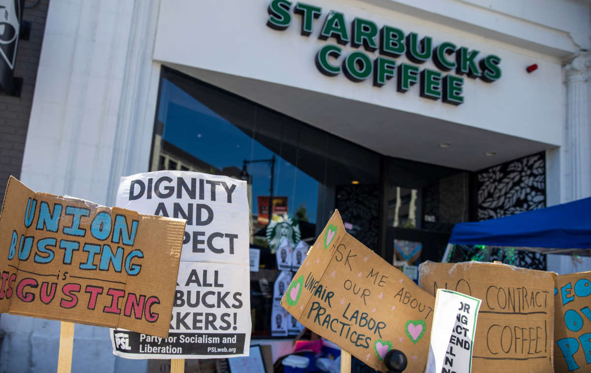 Signs are displayed outside of Starbucks Coffee in Brookline, Massachusetts, on August 12, 2022.
