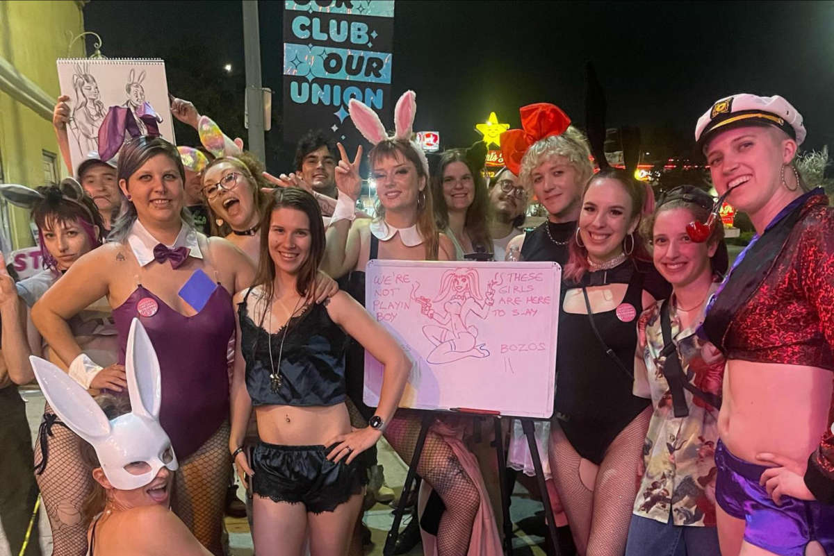 Dancers and supporters take part in a picket line outside of Star Garden Topless Dive Bar in North Hollywood.