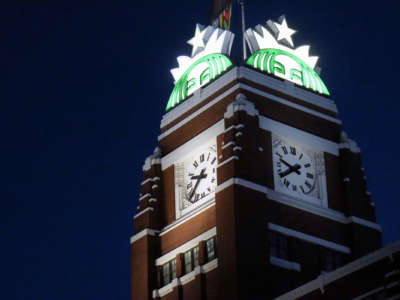 Starbucks headquarters clock tower at night