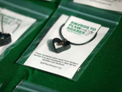 Iron hearts charms made from gun barrels are seen being displayed