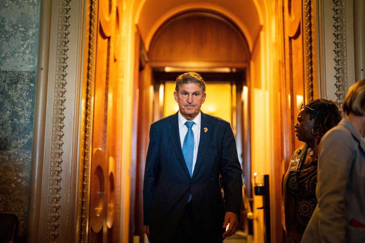 Sen. Joe Manchin departs from the Senate side of the U.S. Capitol Building after a series of amendment votes on the Inflation Reduct Act at the U.S. Capitol on August 7, 2022, in Washington, D.C.