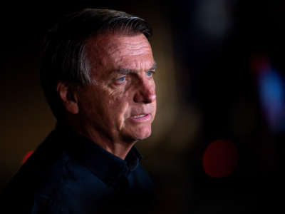 Brazilian President Jair Bolsonaro talks during a press conference at the end of the general elections day at the main entrance of Alvorada Palace on October 2, 2022, in Brasilia, Brazil.