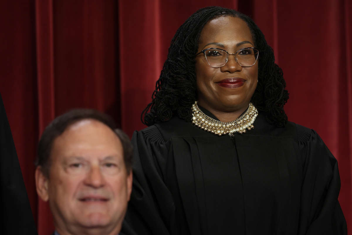 Supreme Court Associate Justice Samuel Alito, left, and Associate Justice Ketanji Brown Jackson pose for an official portrait at the East Conference Room of the Supreme Court building on October 7, 2022, in Washington, D.C.