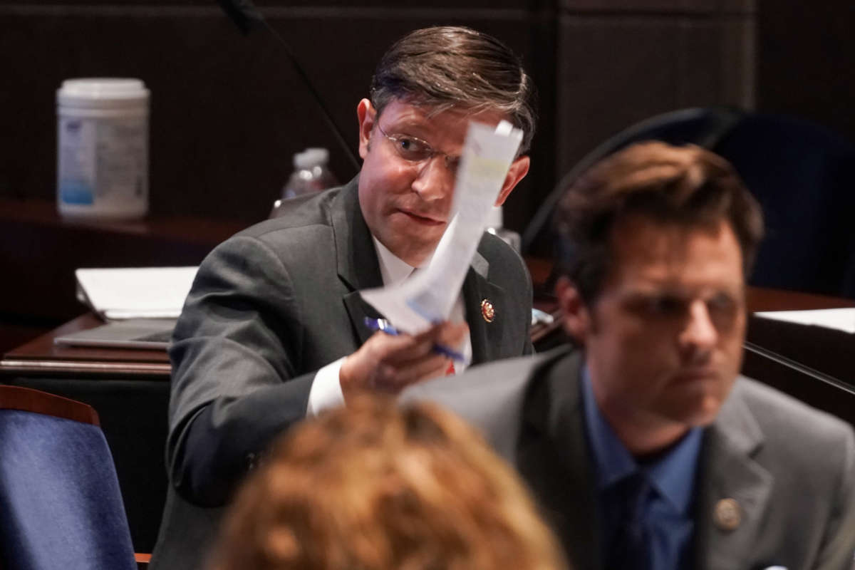 Rep. Mike Johnson holds up a news article during a House Judiciary Committee hearing on June 17, 2020, in Washington, D.C.