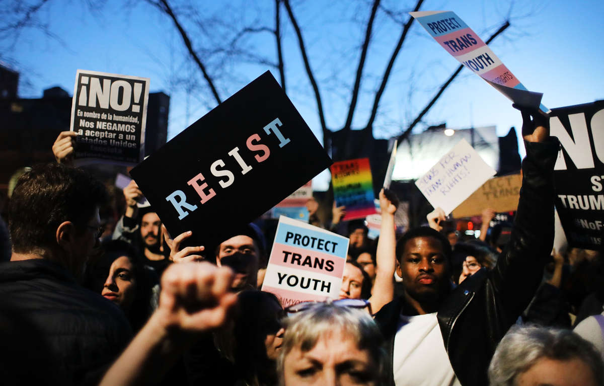 Hundreds protest for the rights of transgender youth outside the Stonewall Inn on February 23, 2017 in New York City.