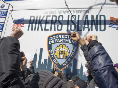 Activists demand the closure of Rikers Island jail on February 28, 2022 at the gate to Rikers Island in Queens, New York.