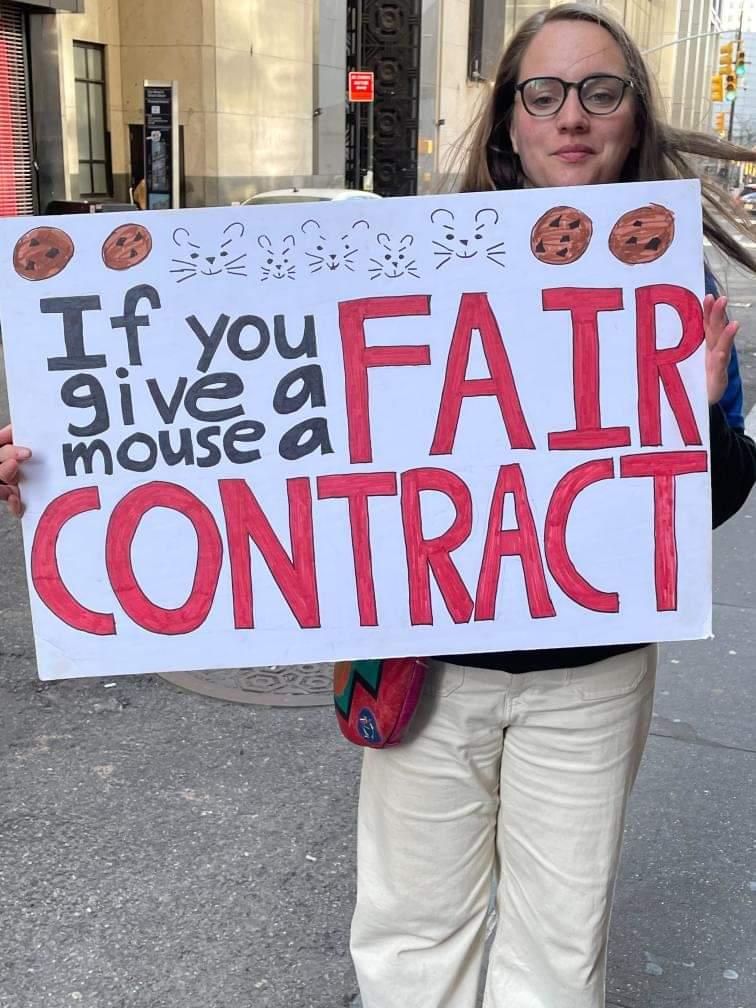 A sign seen on the picket line of striking HarperCollins employees on November 10, 2022.