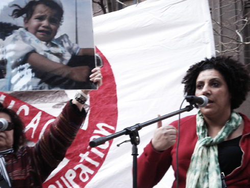 Fatma Hindi addresses the antiwar rally.