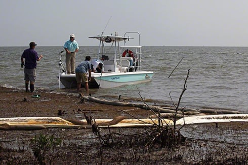Sampling team on oil-soaked beach, Casse-Tete Isle, Louisiana, August, 16, 2010.