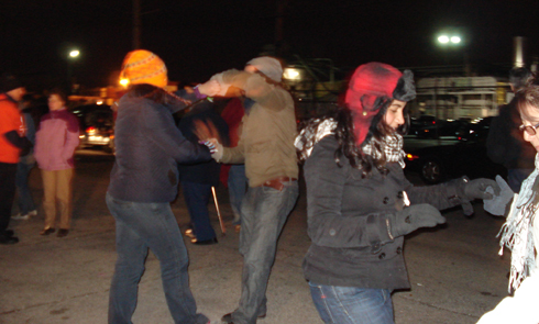 Immigrant rights activists dance to cumbia music during the all-night rally.