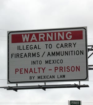 Sign by Mexican Border