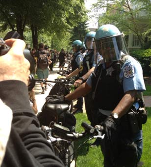 Police in riot gear guarding the house of Mayor Rahm Emanuel