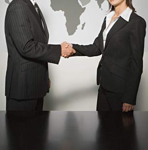 Business people shake hands