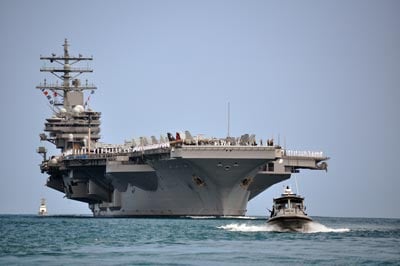 The Nimitz-class aircraft carrier USS Ronald Reagan (CVN 76) arrives at Joint Base Pearl Harbor-Hickam, June 28, 2010. The approximate cost of a Nimitz-class aircraft carrier is 4.5 billion dollars. 