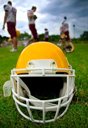 College football helmet on ground