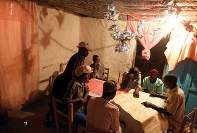 In Haiti, members of the Union of Peasant Groups of Bay map out the families and resources in their community as a step in planning and tracking their local development process. (Photo: Ben Depp)