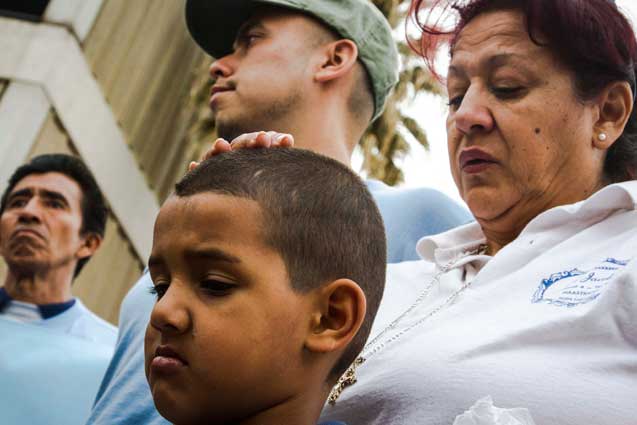 Raul Alcaraz Ochoa, Lydia Lopez, Rene Meza's mother-in-law, and one of René Meza's six children. (Photo: Murphy Joseph Woodhouse)