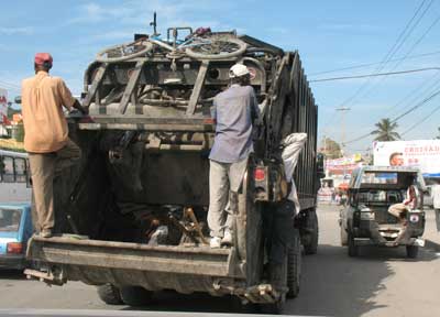 A garbage truck passing in Haiti.