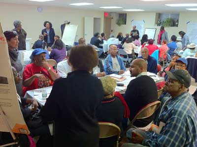 People share capital budget ideas in a participatory budgeting meeting in New York, October 21, 2011.