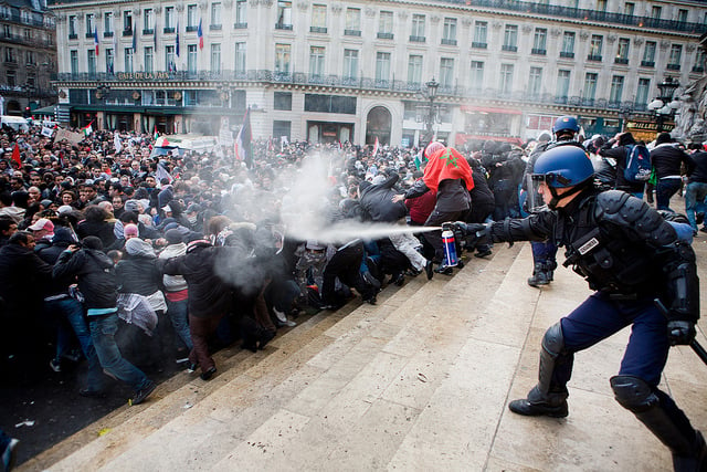 January, 2009: French police spray demonstrators at Gaza solidarity rally. Pro-Palistinian demonstrations have been banned in France since July of 2014. (Photo: looking4poetry)