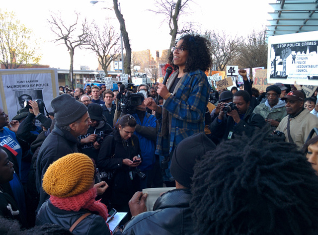 Organizer Page May reminds the crowd to honor Black women killed by police, as well as Black men. (Photo: Kelly Hayes)